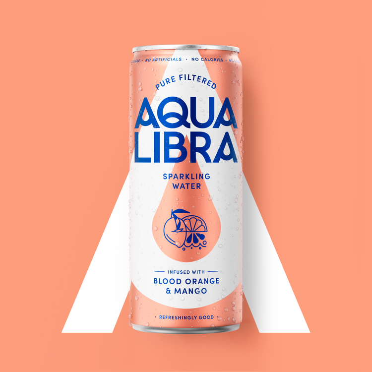 Aqua Libra sparkling water can with blood orange and mango flavor on a peach background