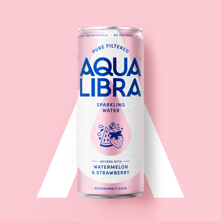 Aqua Libra sparkling water can with pink label on a pink background